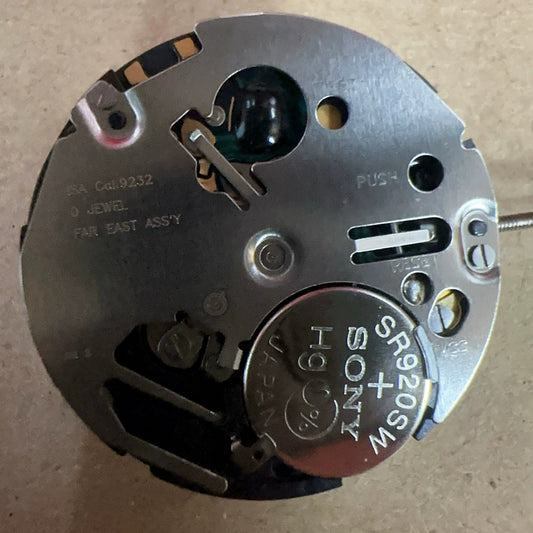 Swiss Made ISA9232 quartz movement watch part with five silver hands for precise timekeeping.