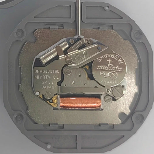 Japan Made Miyota 2453 quartz watch movement with large date display at 3 o'clock, precision timekeeping.
