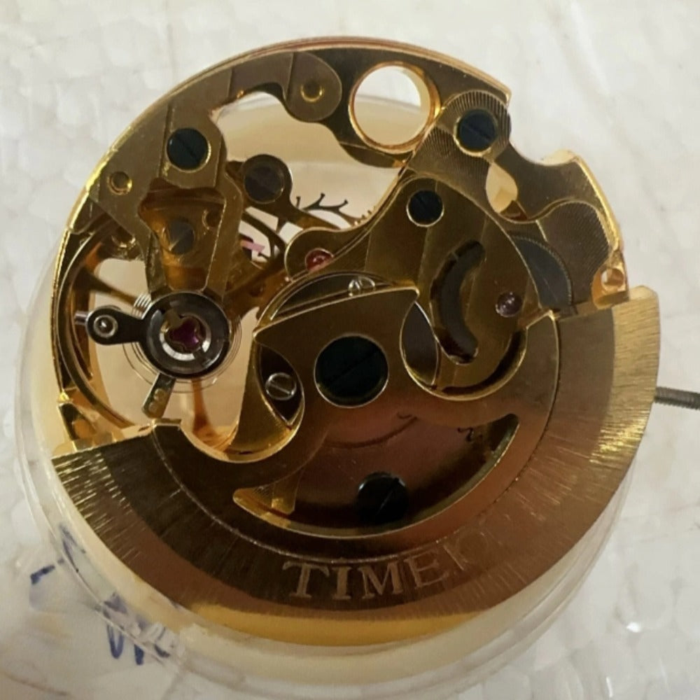 Golden Dandong 7120 mechanical watch part with intricate hollow design, ideal for luxury watch repairs.