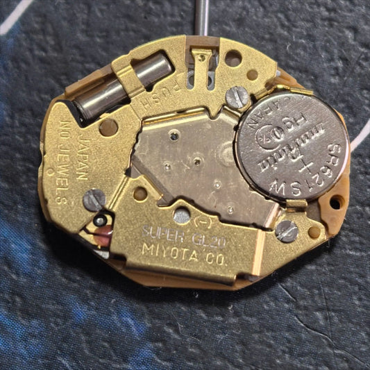 Japan Made Miyota GL20 quartz watch repair part showing dual hands for precision timekeeping.