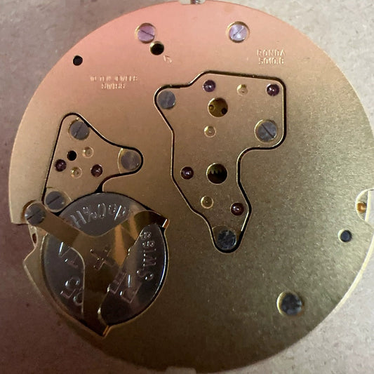Swiss Made Ronda 5010.B golden quartz movement watch part for precise timekeeping in accessories.