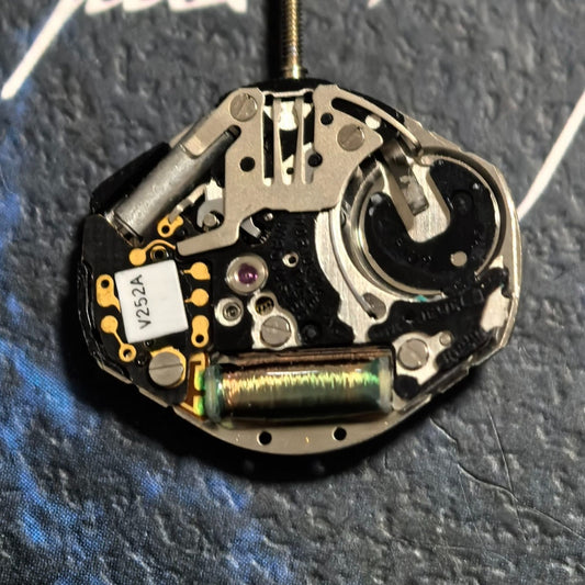 Japan Morioka Tokei V252A quartz watch movement featuring two hands and a small second for precise timekeeping.