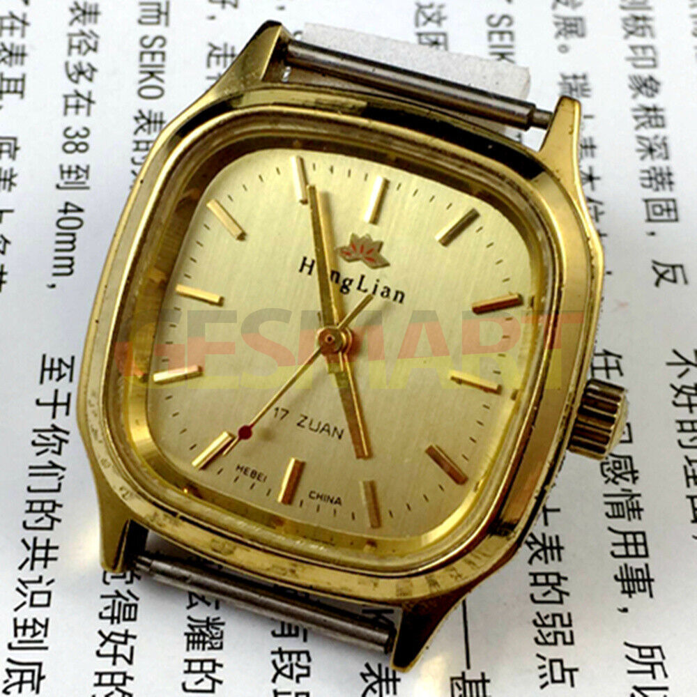 HONGLIAN manual mechanical watch with square golden case, golden nail markers, and elegant classic golden dial.