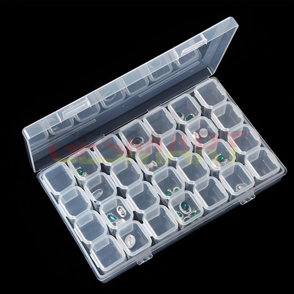 Clear 28-grid mini parts toolbox with hinged lid for organized, portable storage of small watch accessories.