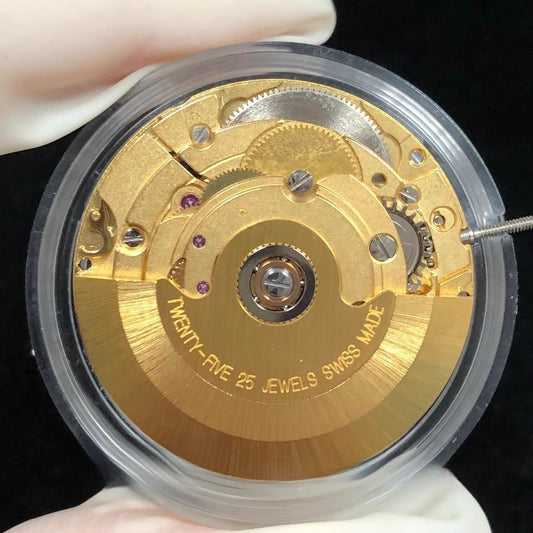 Swiss Made ETA 2824 hollow golden mechanical watch movement for precise timekeeping.