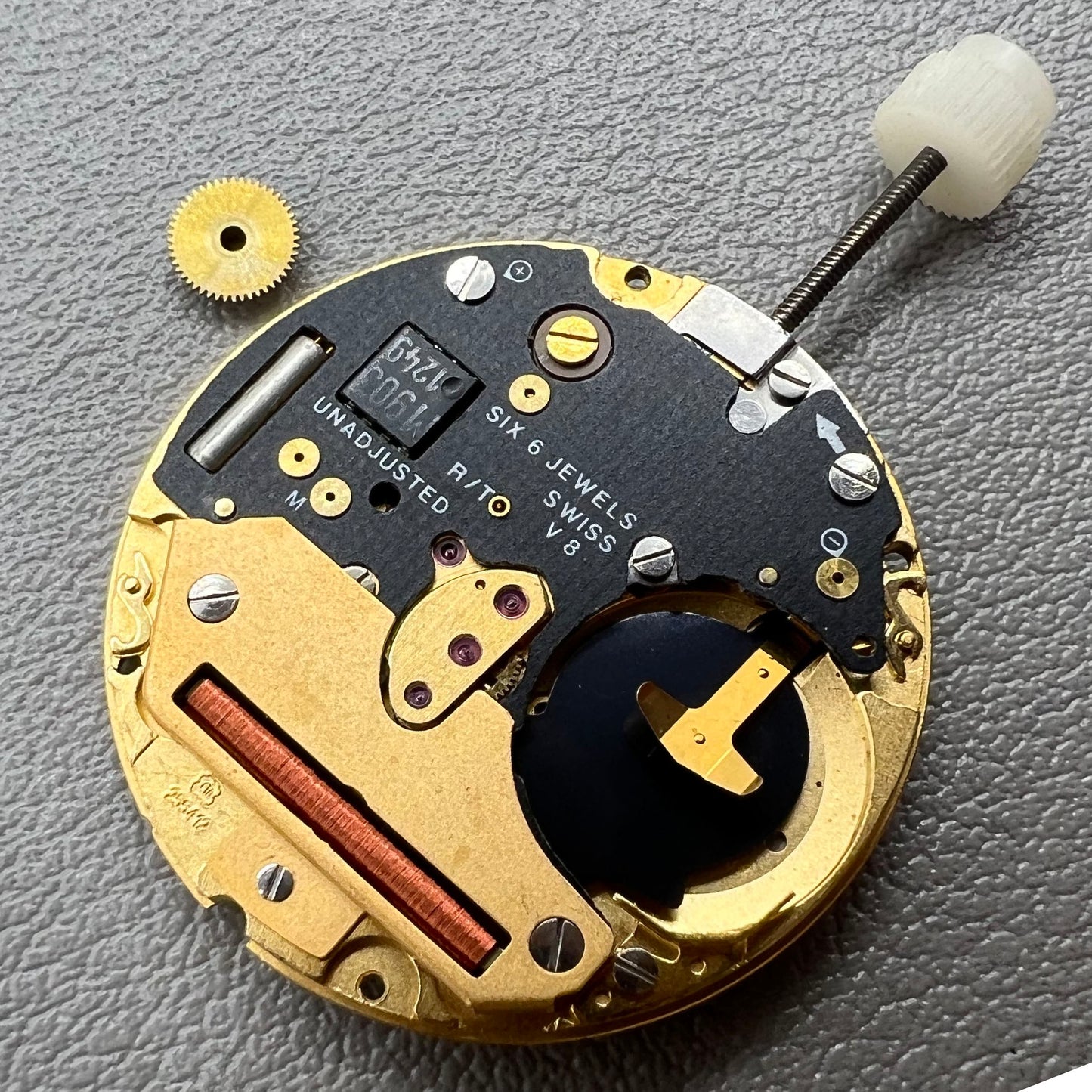 Swiss ETA255.412 quartz watch movement with 3 hands and white dial, precision craftsmanship by ETA.