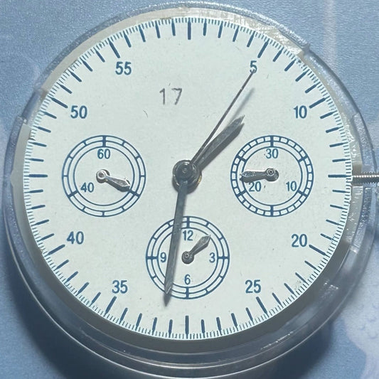China Made Golden Dandong 7750 watch movement with small seconds at 3, 6, and 9 o?clock positions.