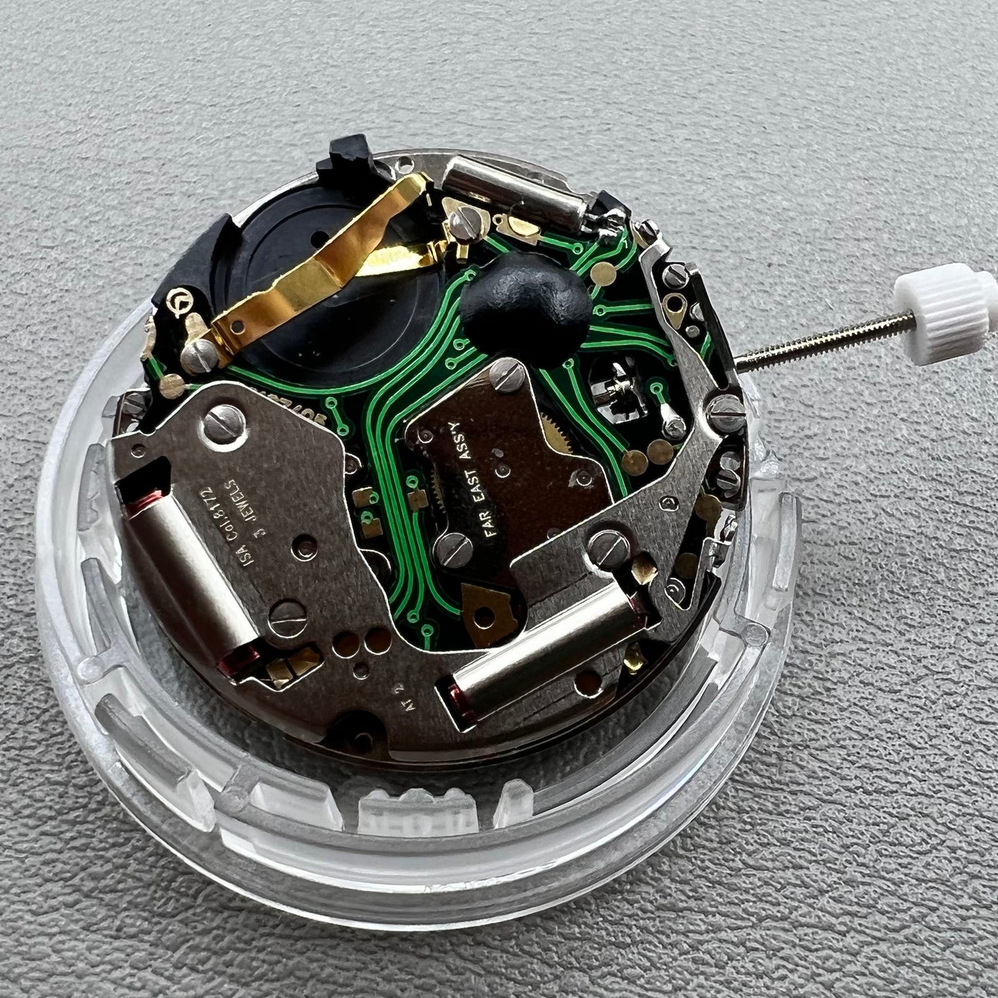 Swiss ISA 8172 Date@6 quartz watch movement replacement by ISA, precise timekeeping for watch repairs.