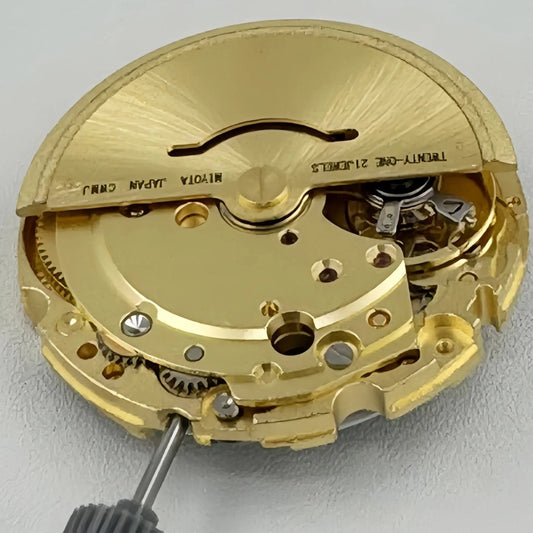 Japan Original Gold 8215 automatic watch mechanism showcasing precise mechanical movement.