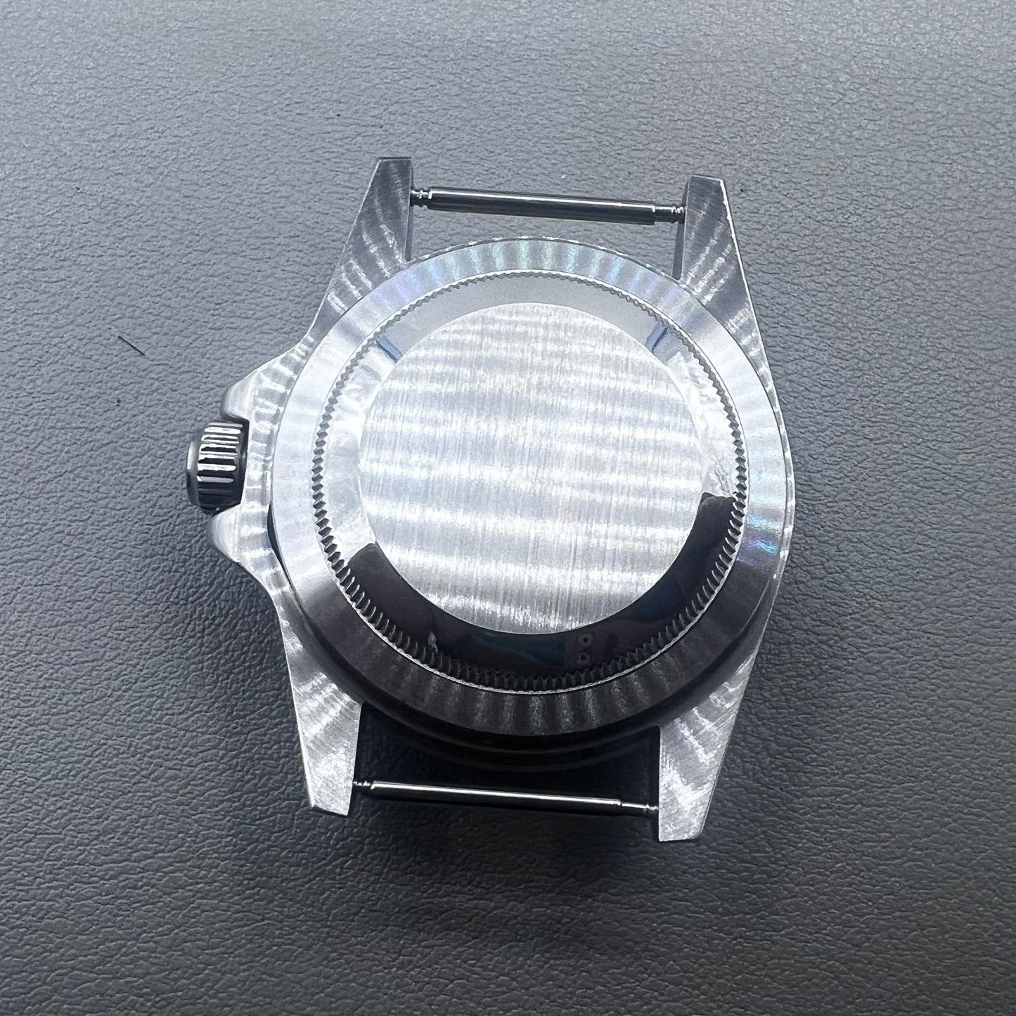 39.5mm stainless steel waterproof watch case with sapphire glass, compatible with NH35/36 movements.