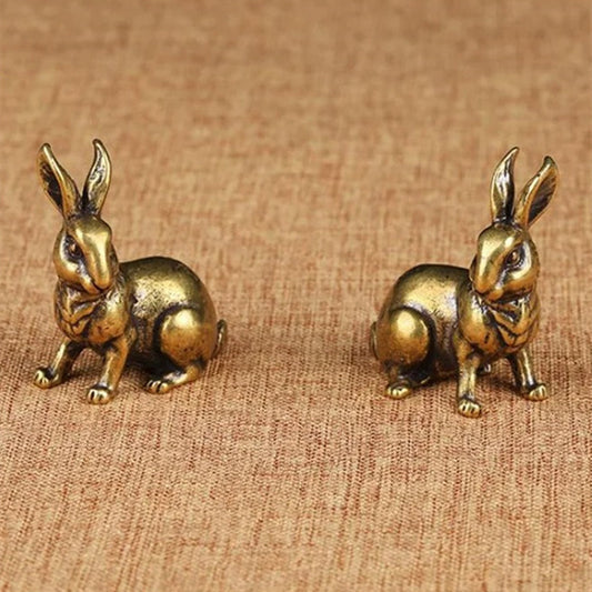 Set of 2 vintage solid copper rabbit figurines, hand-carved bronze trinkets for decor - unique collectibles.
