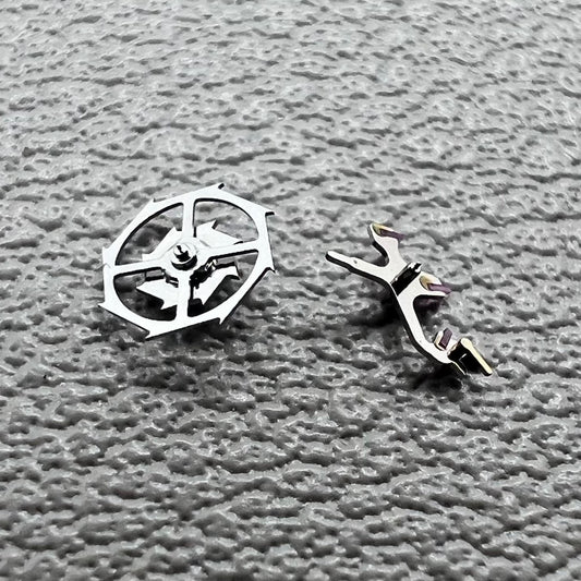 Pallet fork and escape wheel set for Omega 8500A movement, ensuring precise timekeeping and durability.