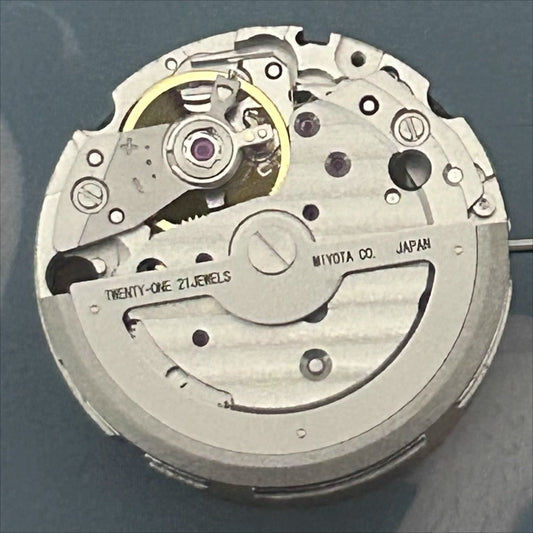 Japan Made Silver Miyota 82S5 mechanical watch movement by Citizen, showcasing precise second stop function.