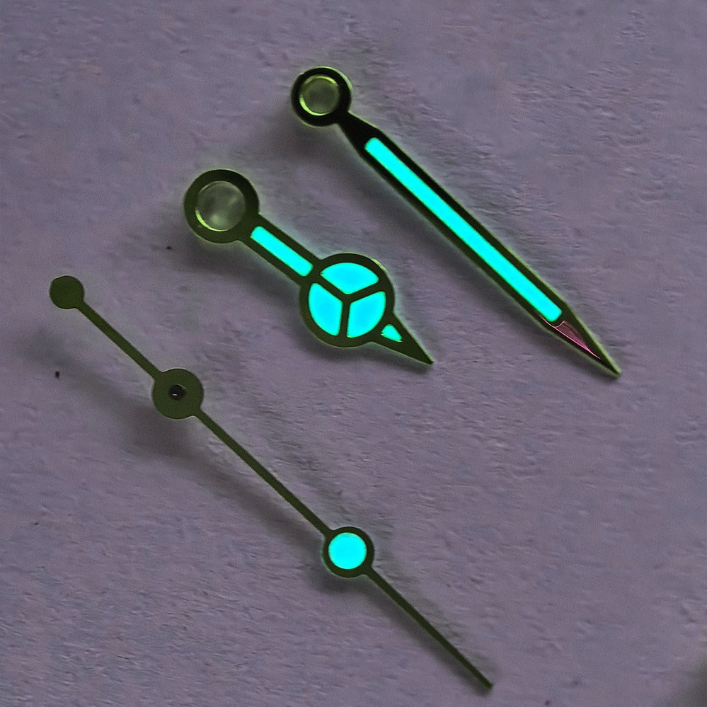 Modified vintage golden trim watch hands set with blue/green lume for 3135 movement, enhancing style and readability.