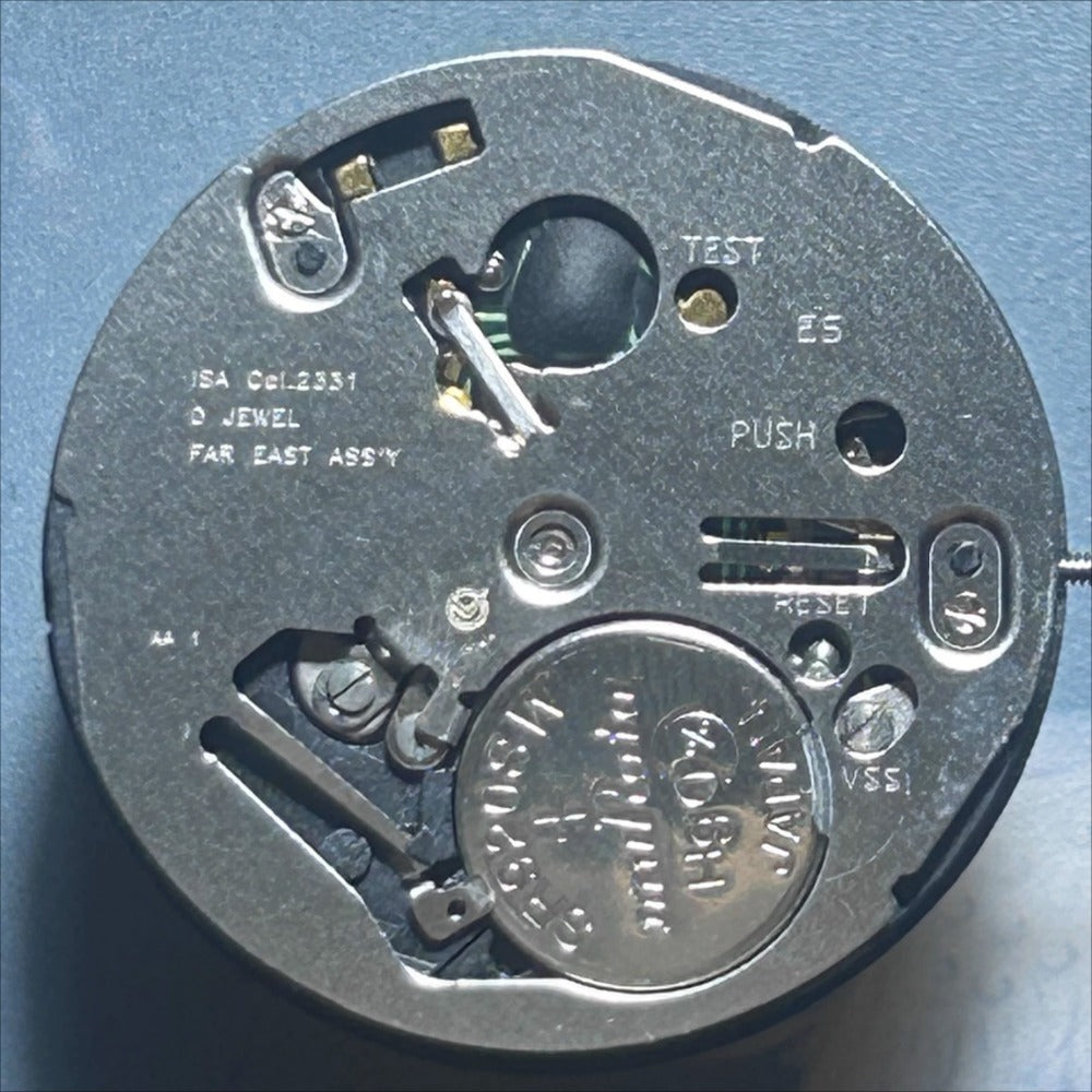 Swiss Made ISA 2331 quartz watch movement with date function for precise repairs and replacements.