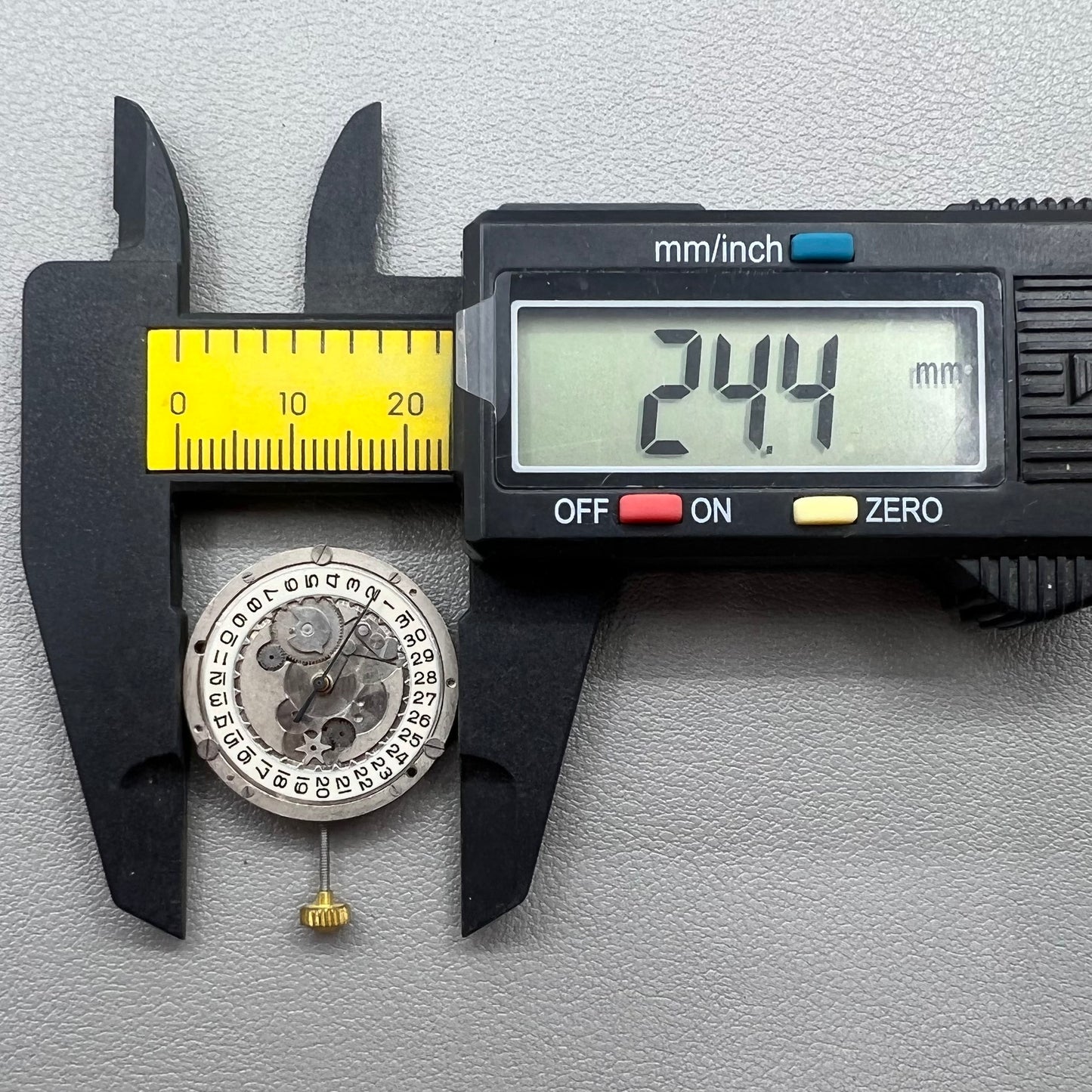 Swiss P-2460 quartz watch movement with 3 hands, precise timekeeping for watch repairs and accessories.