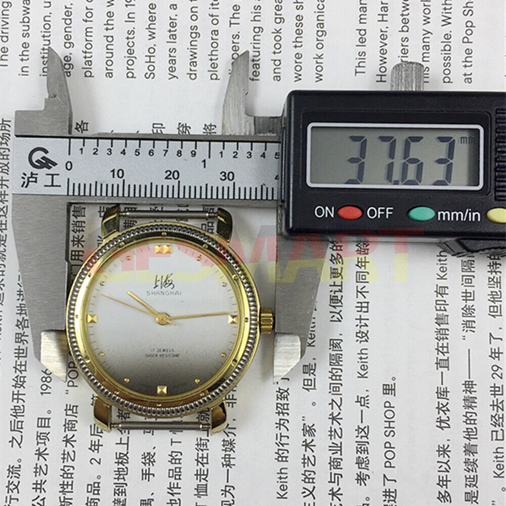 Montre mécanique manuelle fabriquée en usine à Shanghai, cadran gris dégradé à clous dorés