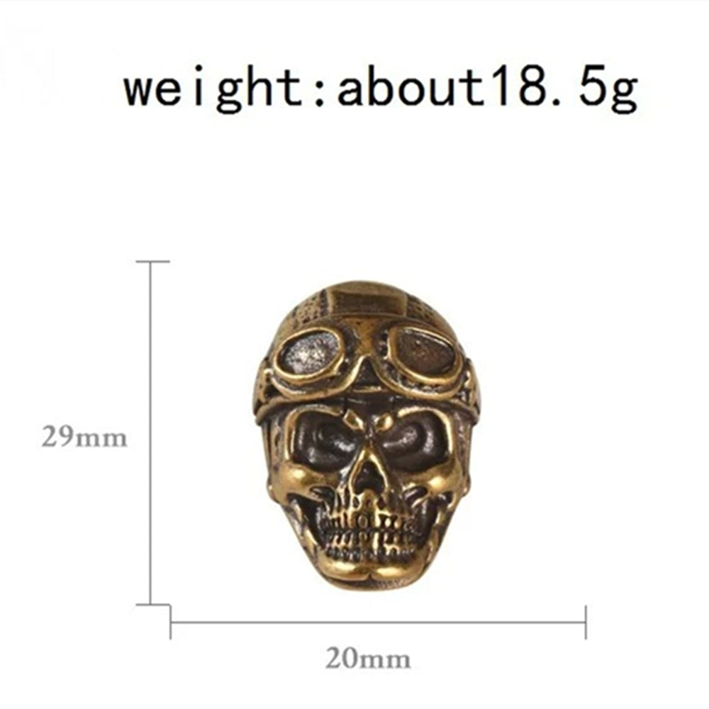 Hand-carved solid copper pilot's skull trinket, vintage bronze with intricate details.
