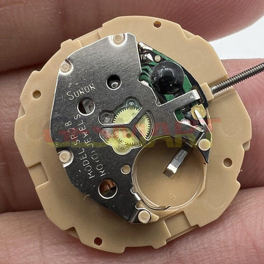 Sunon SP28 quartz watch movement with 3 hands, date, and day display for precise timekeeping.