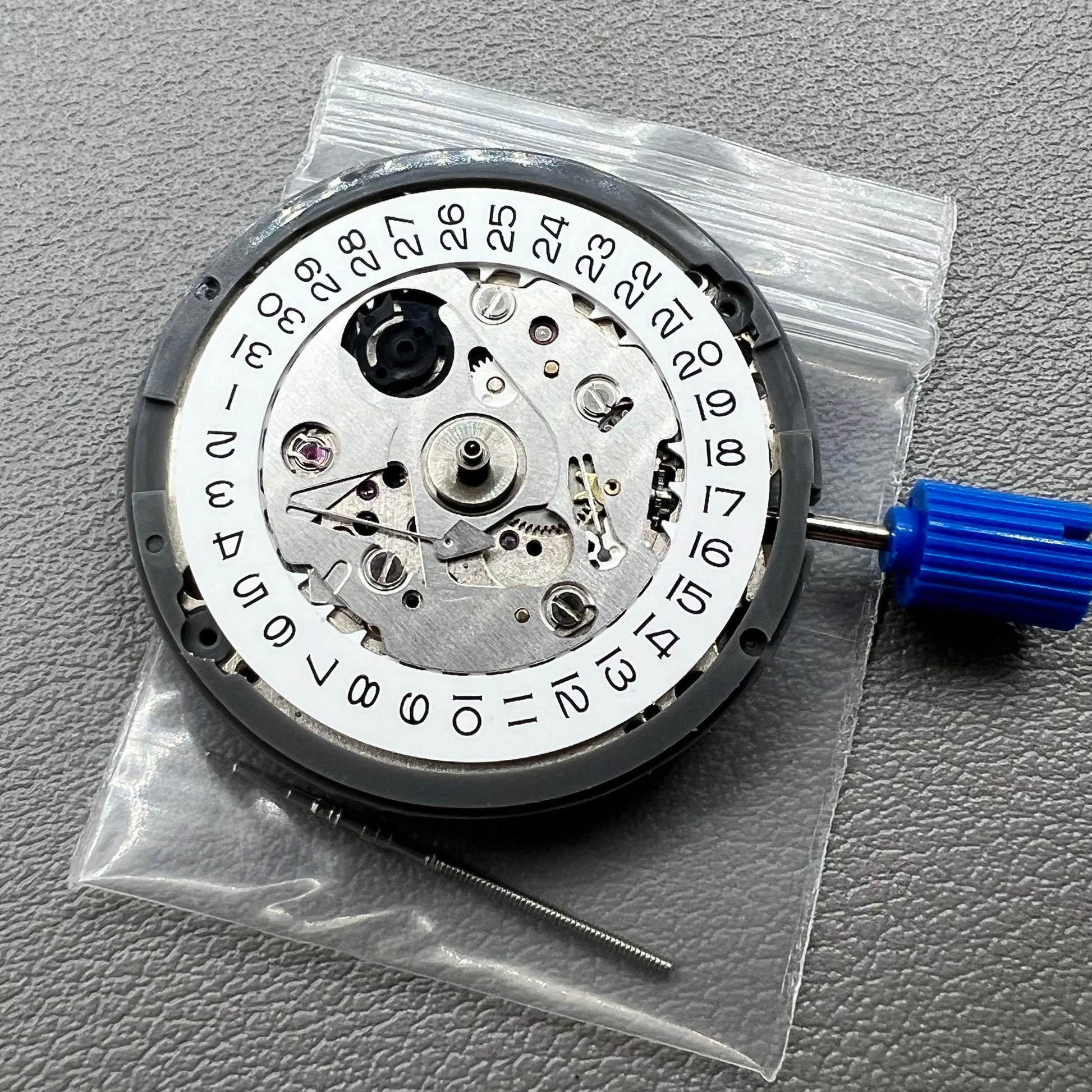 Seiko NH35 automatic watch movement displaying special font details with high accuracy craftsmanship.