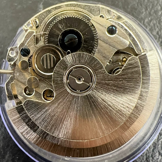 China Made Silver 2240 automatic watch with mechanical movement, small second, and single calendar feature.