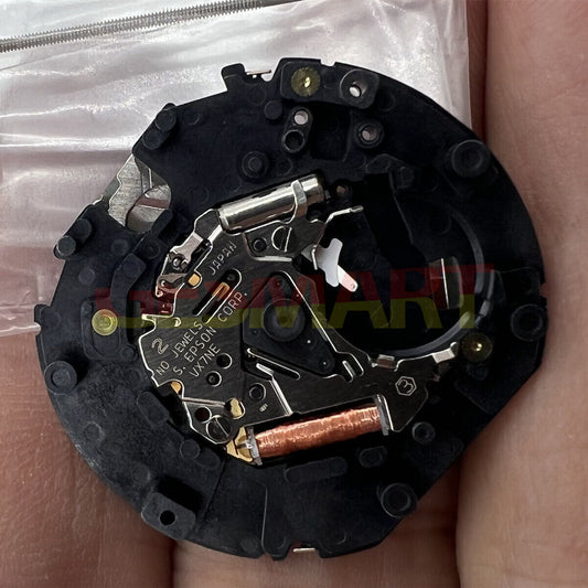 Hattori Epson TMI VX7N quartz watch movement, precision Japan-made component for watch repair.