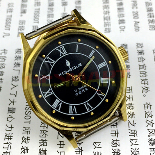 33mm Dandong manual mechanical watch with 17 jewels, black dial, golden nail markers, and three hands.
