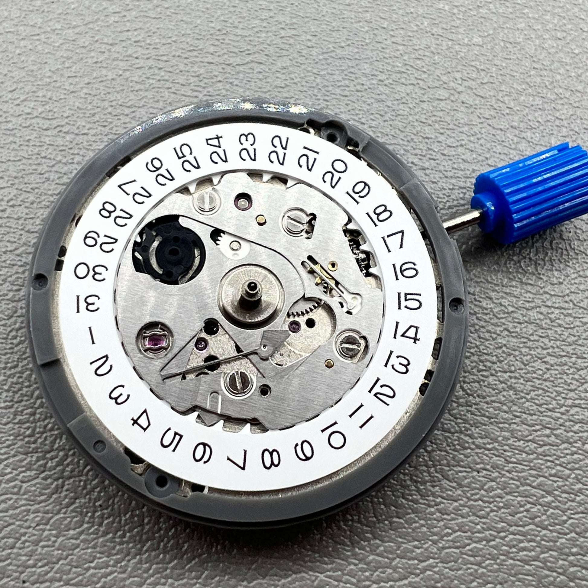 Seiko NH35 automatic watch movement displaying special font details with high accuracy craftsmanship.
