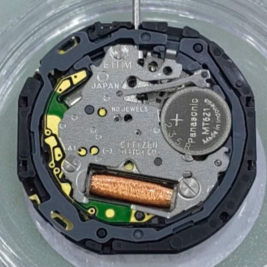 Citizen E111M Eco-Drive solar quartz watch movement for precise timekeeping and durability.