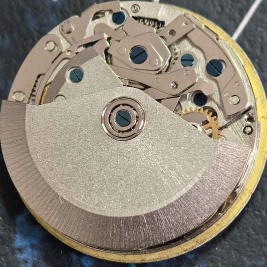 Chinese Dandong watch accessory featuring 7750 mechanical movement with date at 3 and small seconds at 6, 9, and 12 positions.