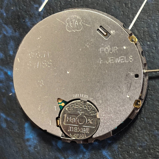Swiss ETA G10.711 quartz watch movement with 6 hands and date at 4 o'clock, suitable replacement part.