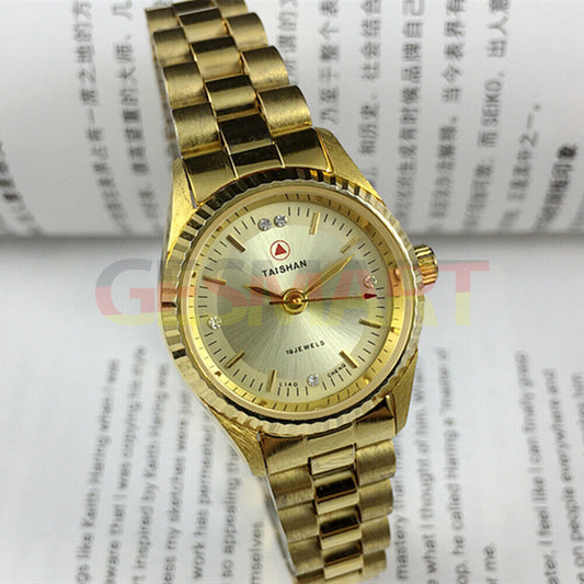 27mm China Made Lady Manual Mechanical Watch with 19 Jewels, golden dial, and nail markers.