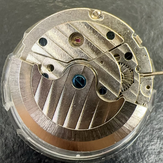 Shanghai Bare Balance Wheel LB mechanical watch movement showcasing the flywheel and moon phase complications.
