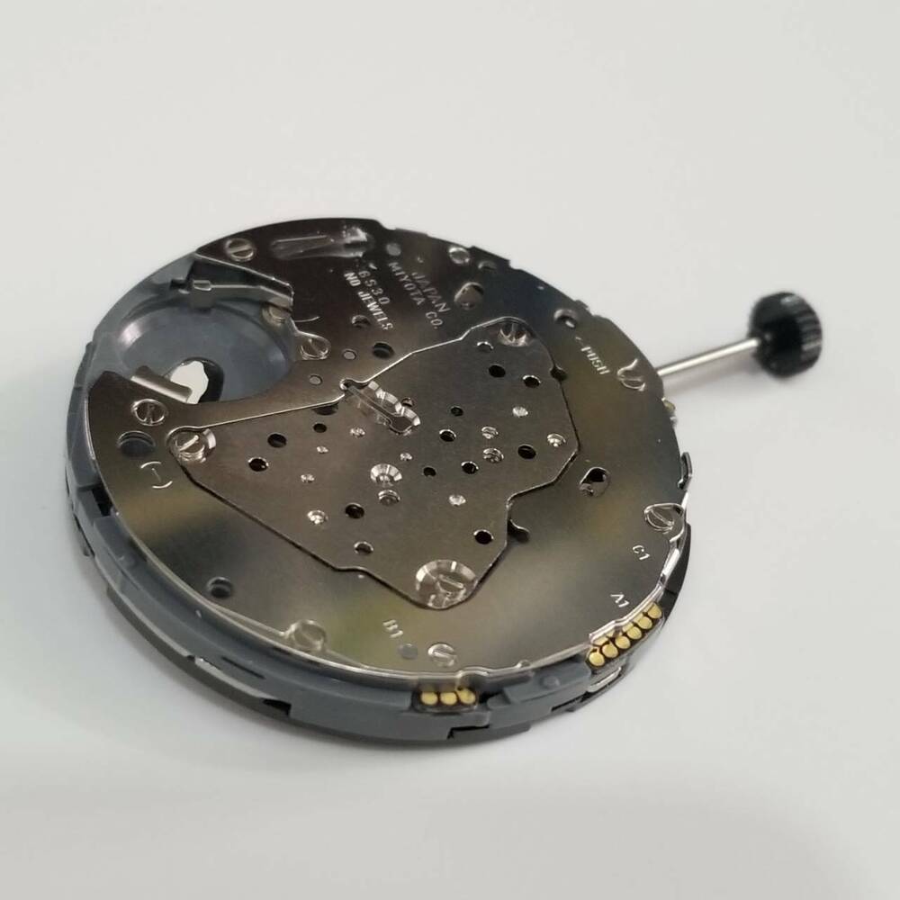 Miyota 6S30 quartz watch movement, precise repair part for watch accessory maintenance.
