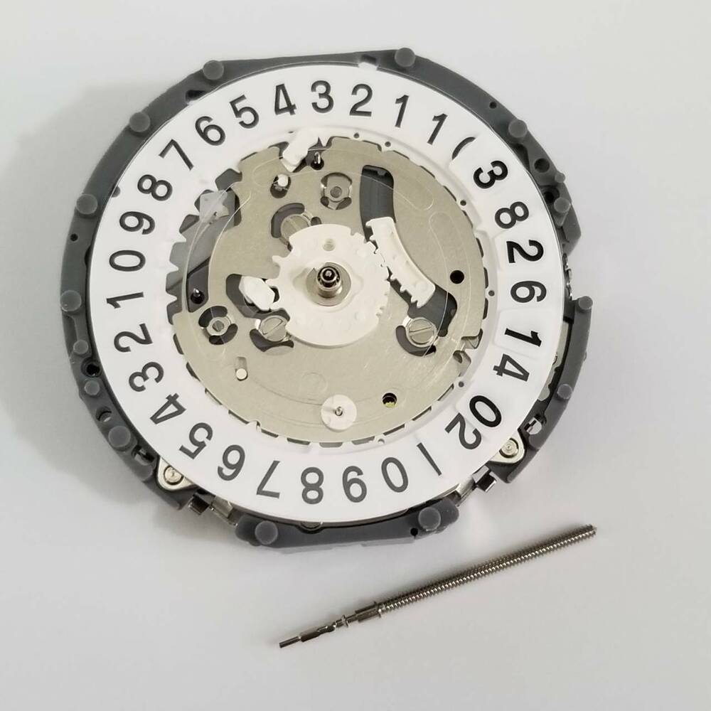 Hattori Epson TMI VK73 quartz watch movement repair part for precise timekeeping.