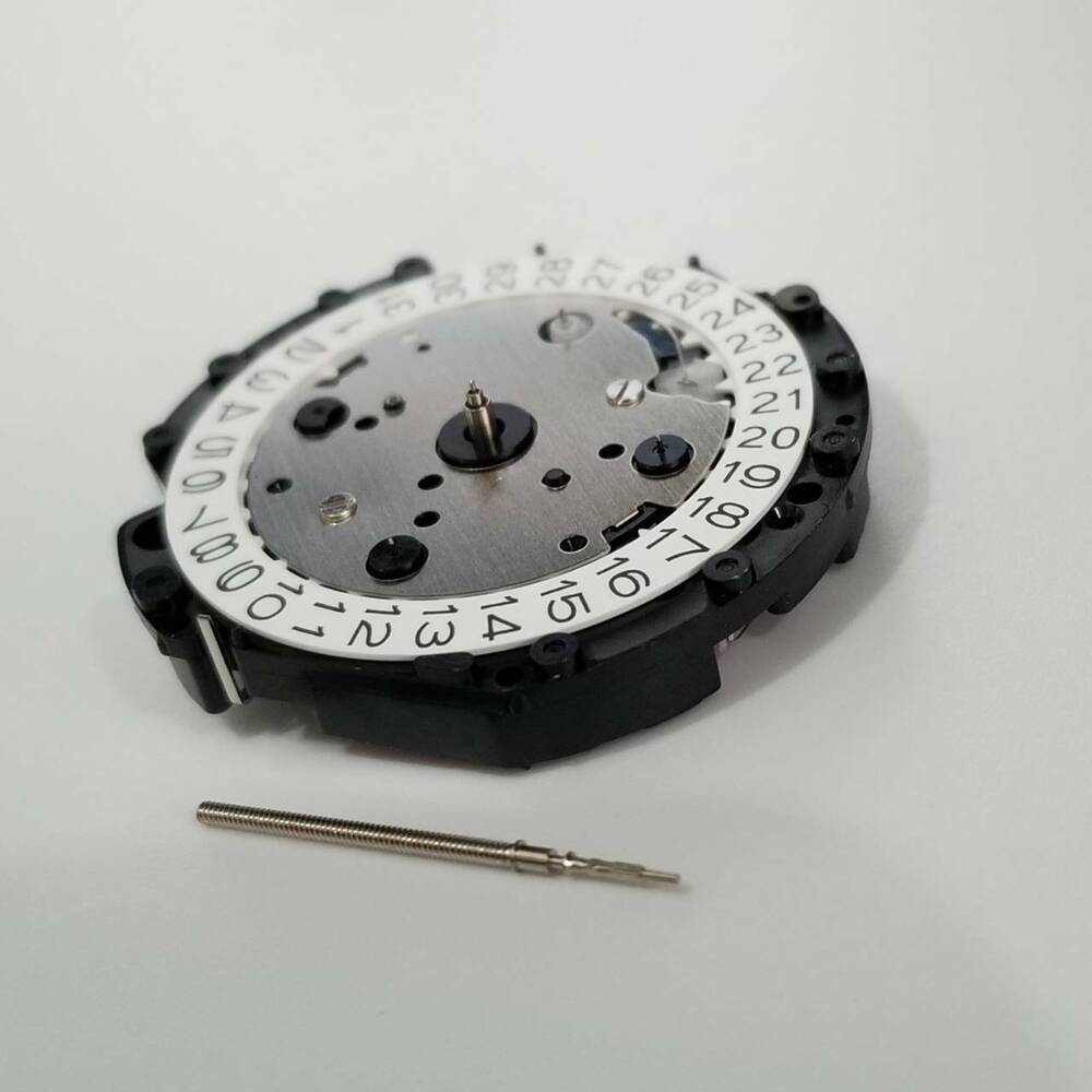 Hattori Epson VD33A quartz watch movement, Japan-made repair part for precision timekeeping.