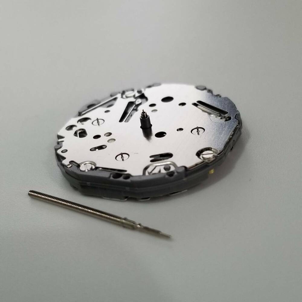 Hattori Epson VH63A quartz watch movement, precision Japanese repair part for timepieces.