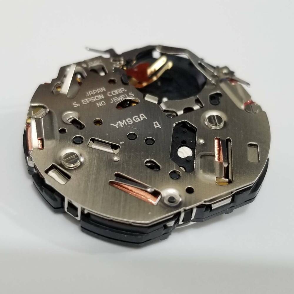S. Epson YM9G quartz watch movement showing precise timekeeping for watch repair accessories.