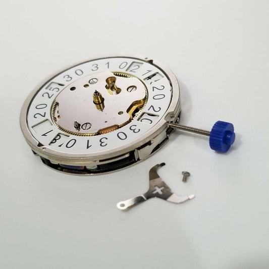 Silver plated Ronda 4210.B quartz watch repair part with big date function, Swiss precision components.