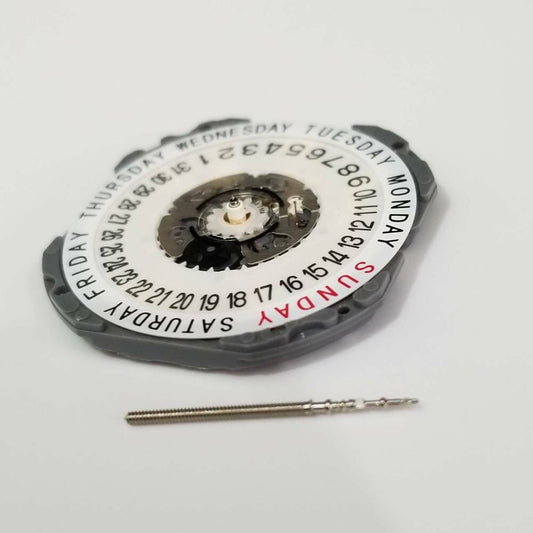 Hattori Epson TMI VJ55 quartz watch movement with date at 6, Japan-made for precise repairs.