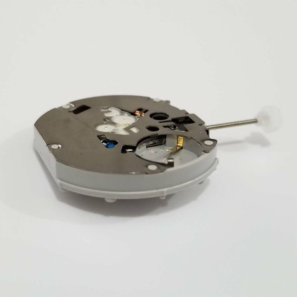 SUNON PE70-2 quartz watch movement showing intricate mechanical components for accurate timekeeping.