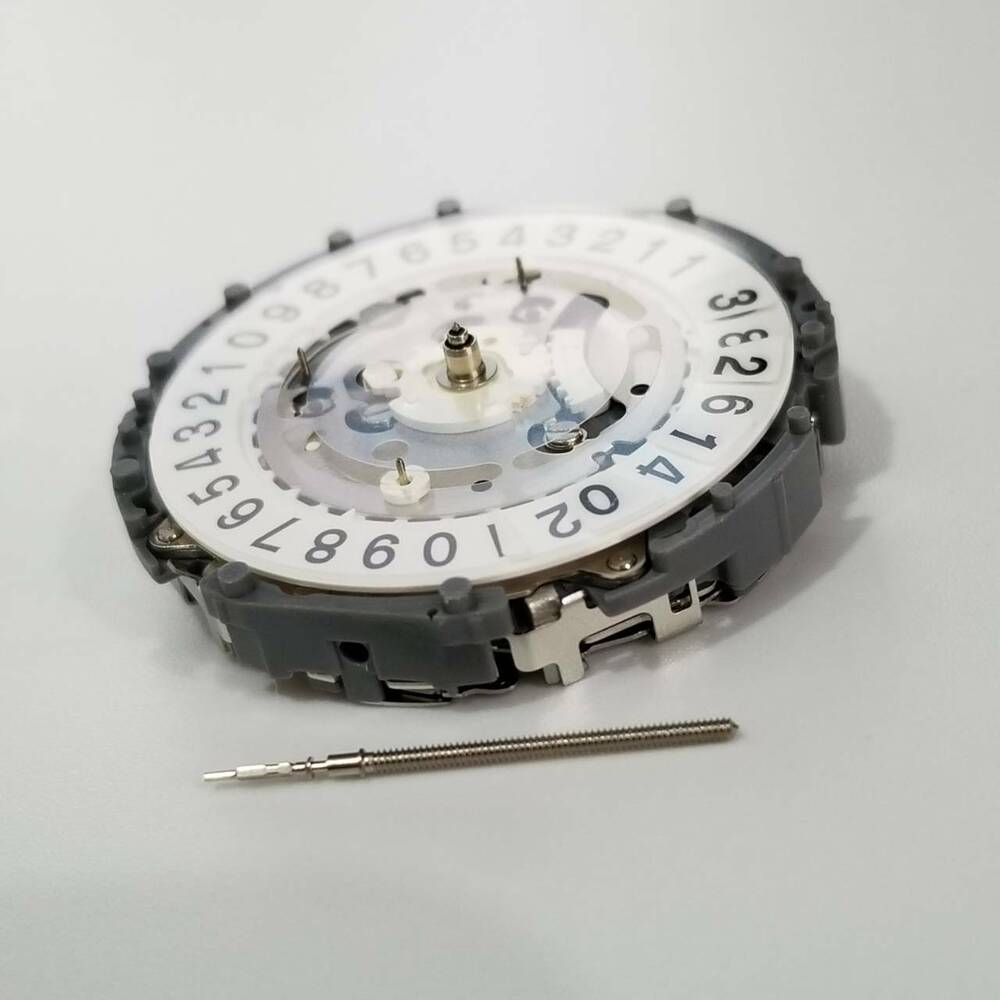 Hattori Epson TMI VK73 quartz watch movement repair part for precise timekeeping.