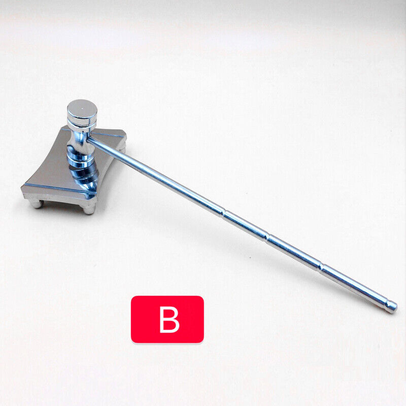Steel hammer and base plate set, sturdy tools designed for precise watch band link adjustments.
