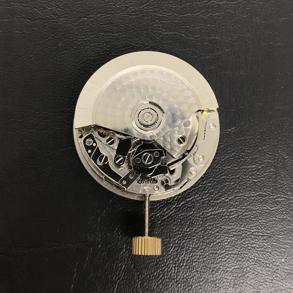 Close-up of Asian 7750 automatic chronograph movement with ETA 7753 layout at 3, 6, and 9 o?clock for watch repair.