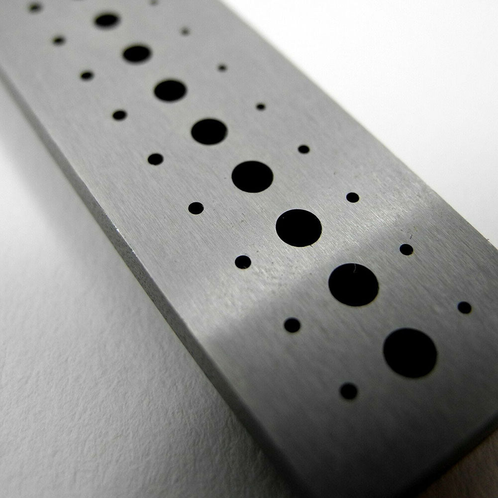 Bergeon 1902 steel staking block for precise riveting in watch accessory repairs, durable tool.