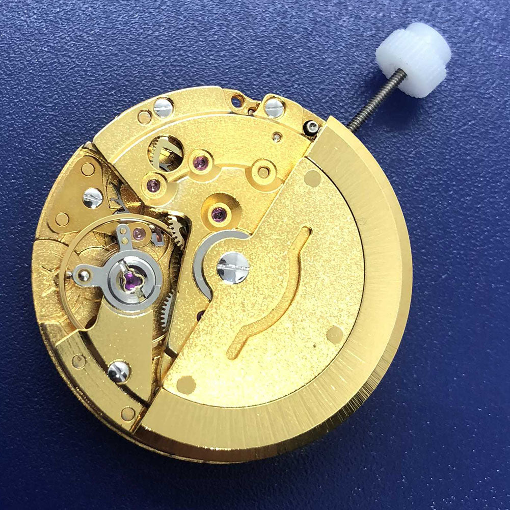 DG2813 automatic mechanical watch movement in golden finish, featuring day and date display.