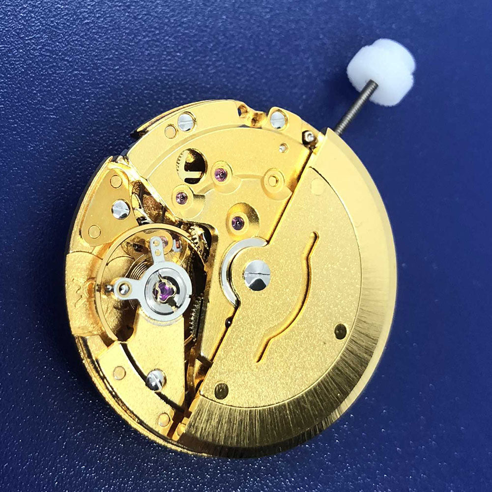 DG2813 automatic mechanical watch movement with golden finish, day and date display, precise and elegant mechanism.
