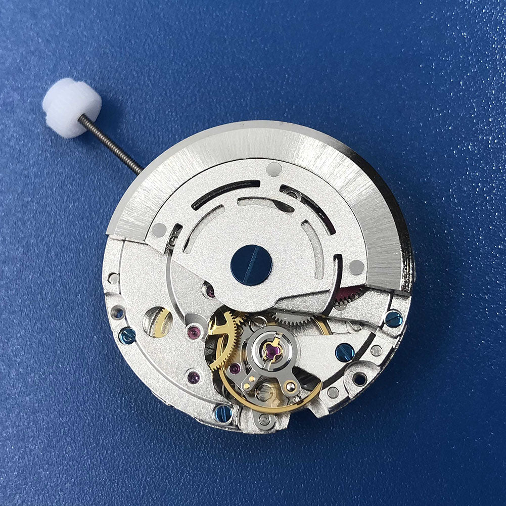 DG2813 silver automatic watch movement with 4 hands and 24-hour GMT function for accurate timekeeping.