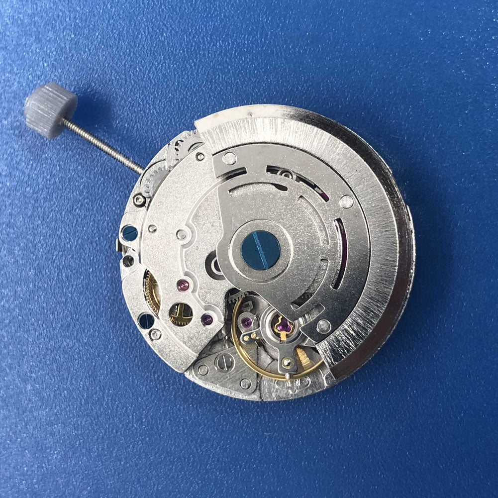 DG2813 automatic watch movement displaying three large hands and a small second subdial at 6 o'clock, no calendar function.
