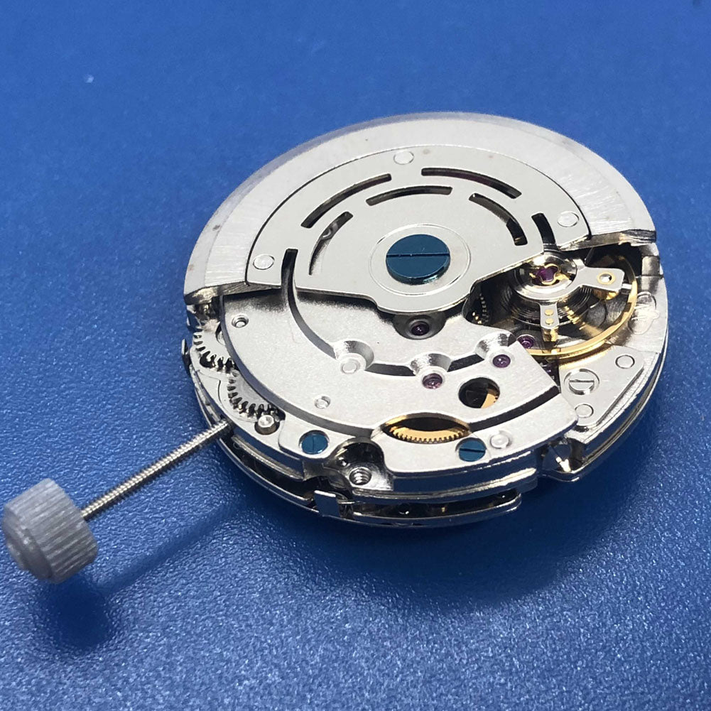 DG2813 automatic watch movement showcasing three big hands and a small second at 6 o'clock, no calendar feature.